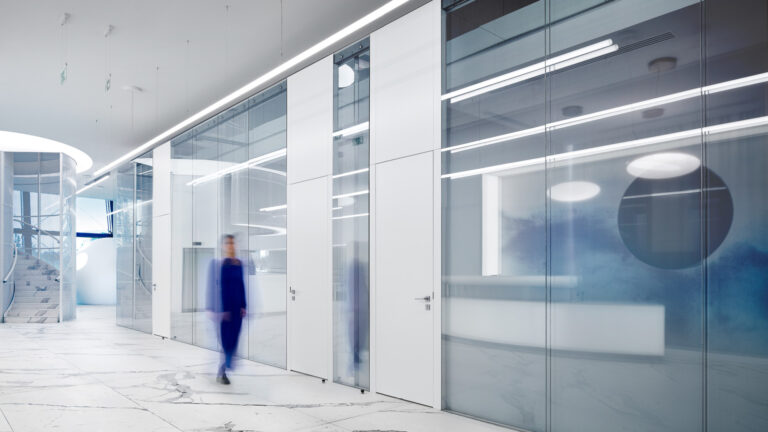 A complex architectural structure that stands out in space like a vertical light column