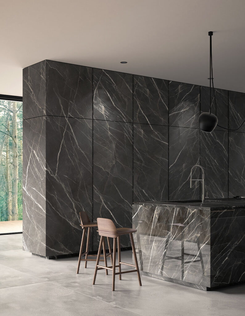 Calacatta Black takes all the refinement of black marble, softening its features with hints of beige.