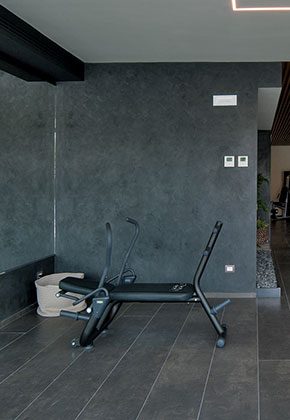 Primordial elements are combined to lend spaces unique tactile sensations